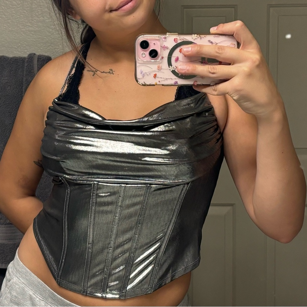 Black and silver corset top in great condition 
Only worn once!
